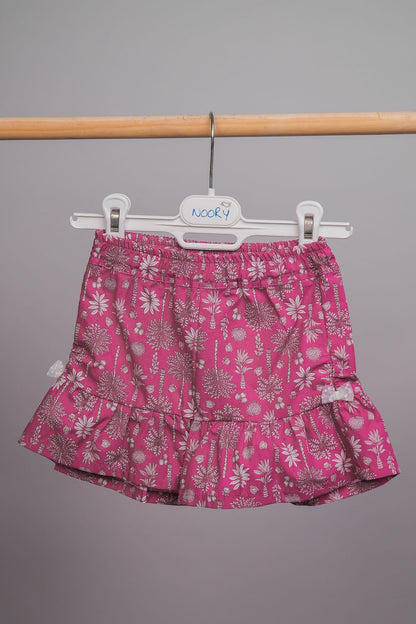 Short pour filles doté d'une ceinture élastiquée et d'un bas volanté