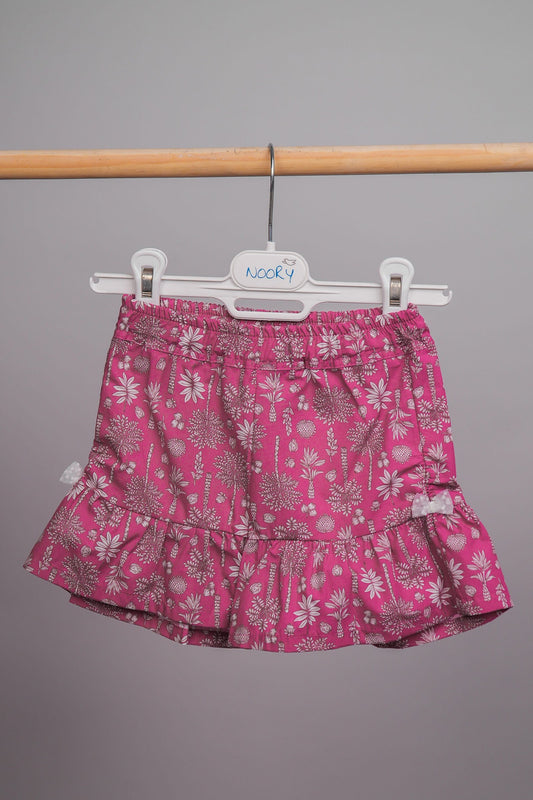 Short pour filles doté d'une ceinture élastiquée et d'un bas volanté