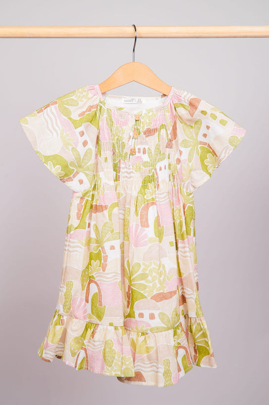 Robe avec manches papillon et son haut smocké délicat