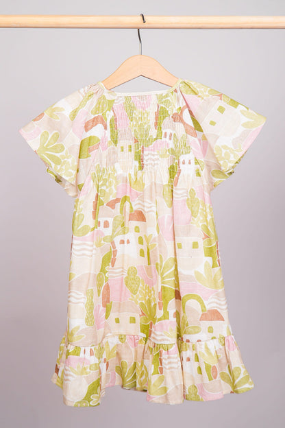 Robe avec manches papillon et son haut smocké délicat